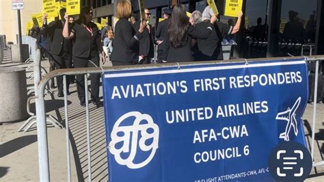 United Airlines flight attendants picket at AUS for fair contracts